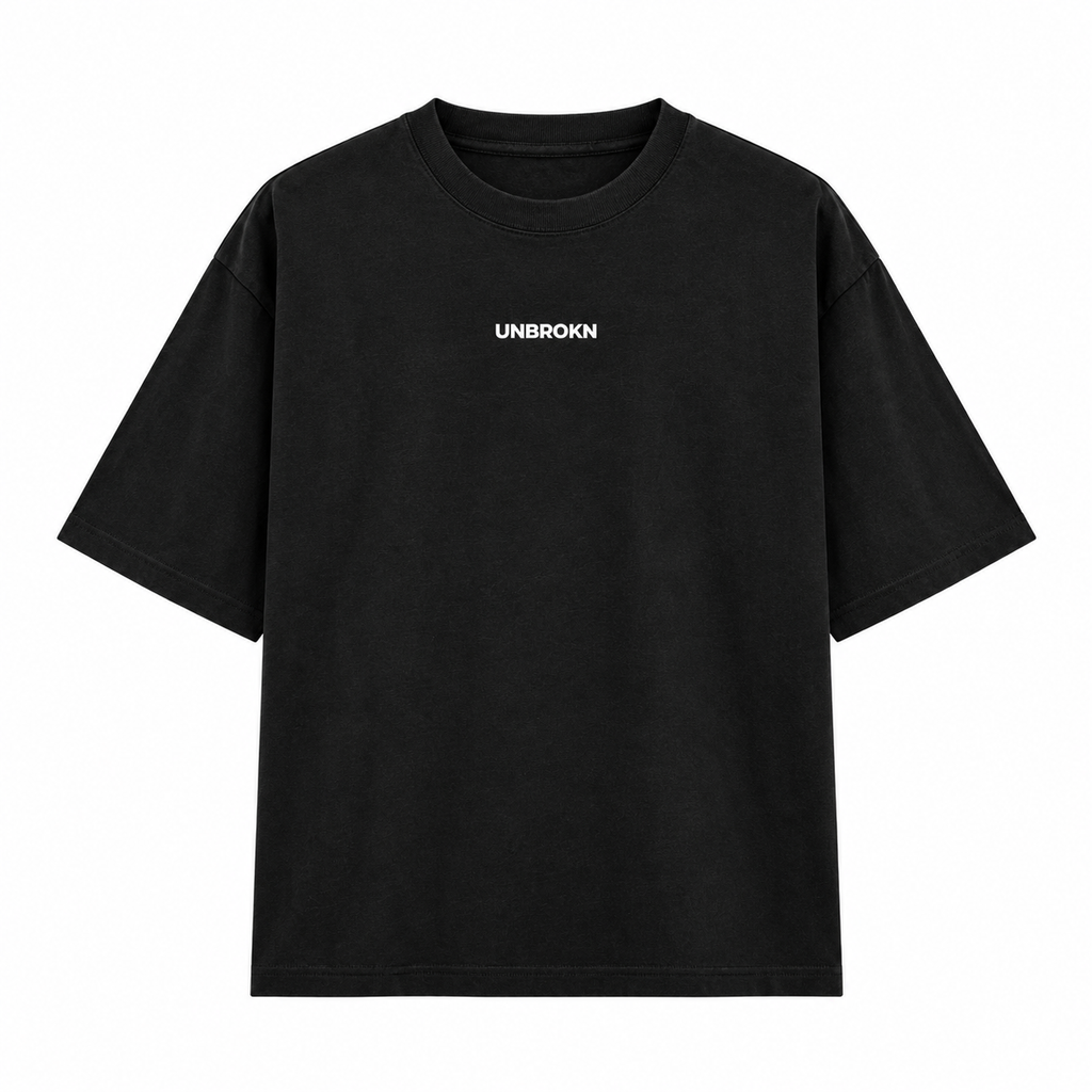 A black short-sleeve crewneck t-shirt with the word 'UNBROKN' printed in white capital letters on the center chest, displayed against a solid white background.