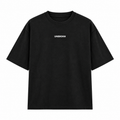 A black short-sleeve crewneck t-shirt with the word 'UNBROKN' printed in white capital letters on the center chest, displayed against a solid white background.